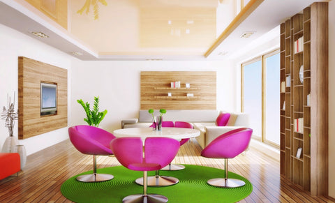Pink chairs on green round rug